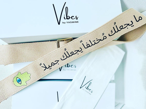 - ما يجعلُك مُختلفاً يجعلُك جميلاً - Arabic Writing Embroidered Purse Strap